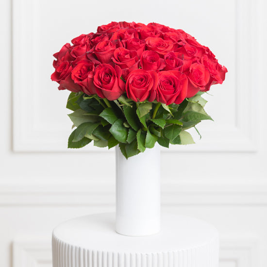 White beautiful roses in a vase